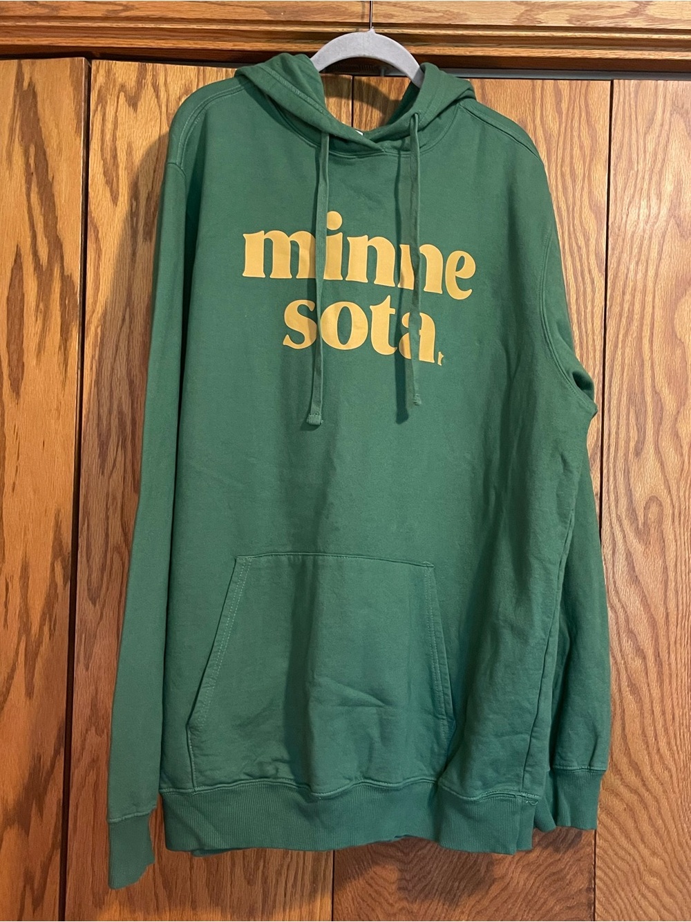 Port and Company Green Hoodie with Gold Minnesota Graphic